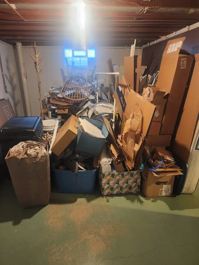 Roll-off dumpster container at job site for 2 Yard Dumpster Rental in Lakeland